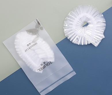 Gorro de baño en bolsa con logo